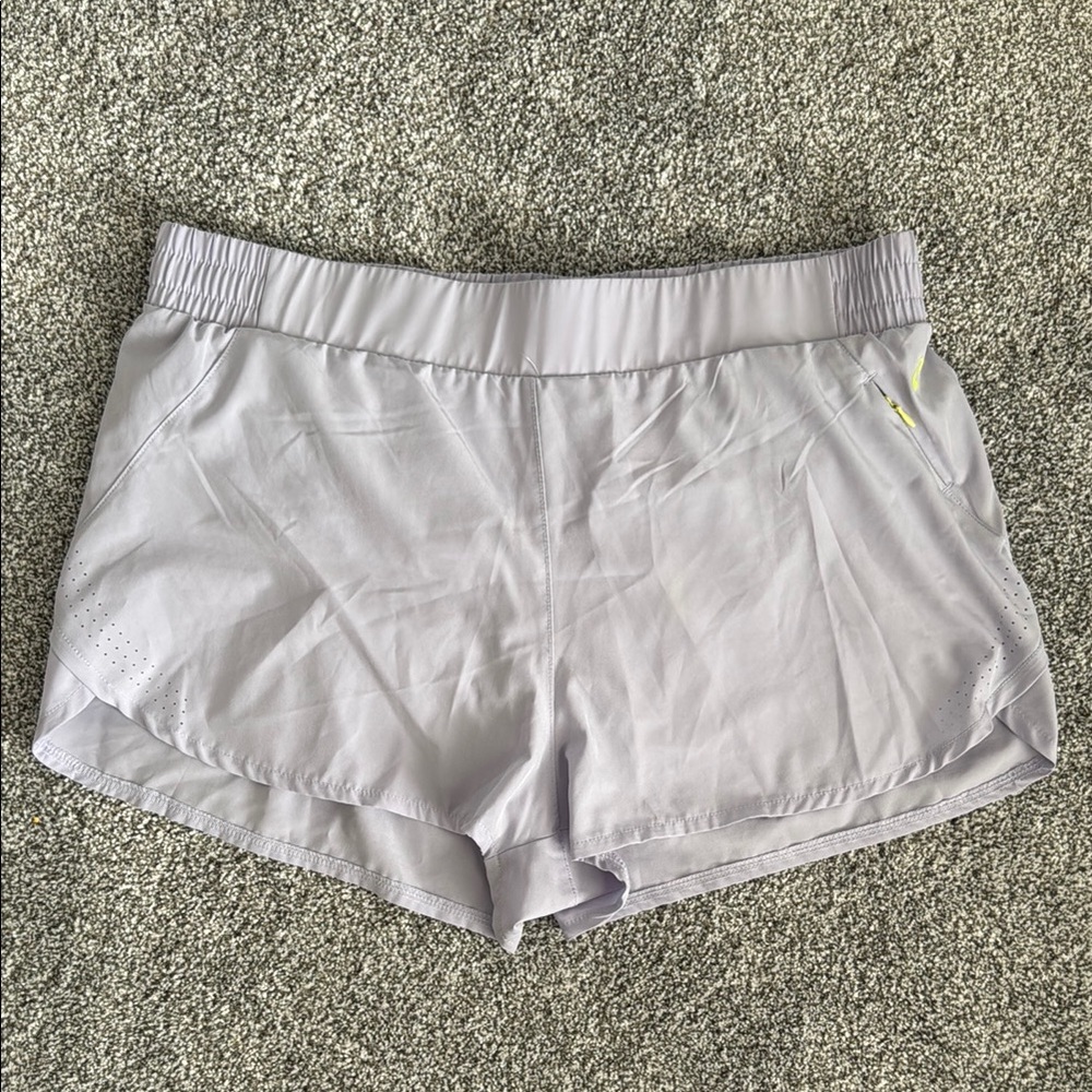 ASICS Women's light purple athletic shorts